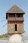 Nessebar -  wooden windmill at the entrance of the old town 